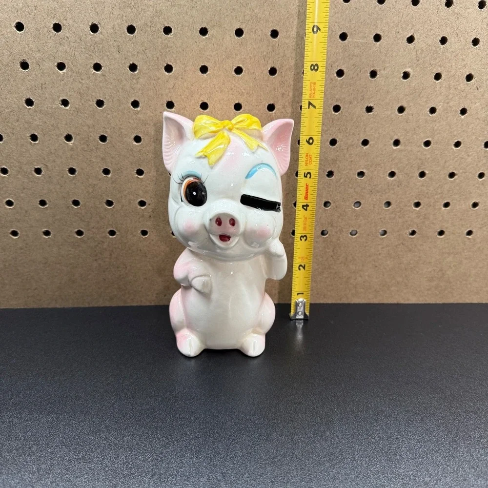 Vintage Japanese Ceramic Piggy Bank with Winking Expression And a Yellow Bow - Picture 9 of 11